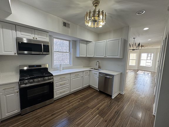 2nd image of 5148 W Henderson St Unit 2