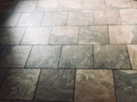 Stone tile floor in main living areas