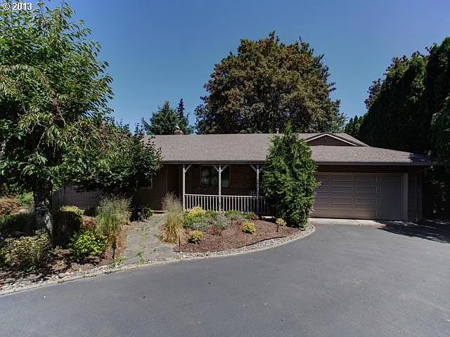 9865 NW Leahy Rd photo 1