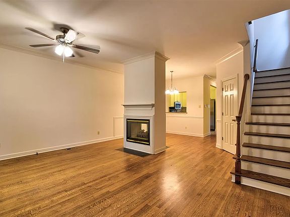 living room/dining room with gas fireplace