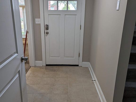 Entry way (viewed from Garage door). One bedroom on the left.