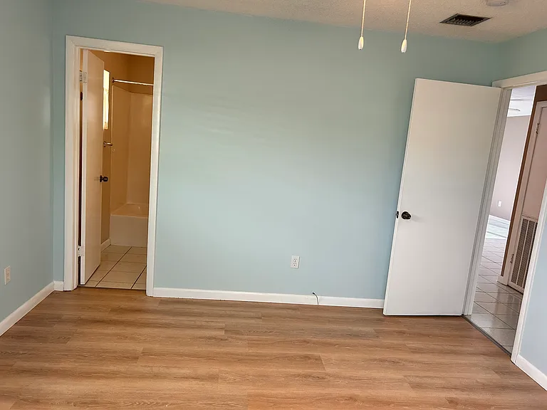 Primary bedroom to primary bath