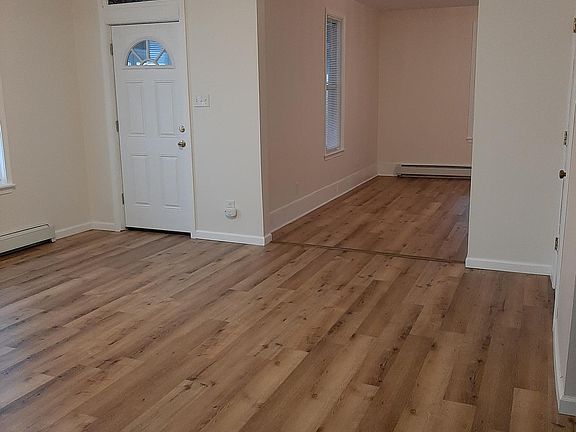 Dining room - looking back into living room and door to front sun room on left