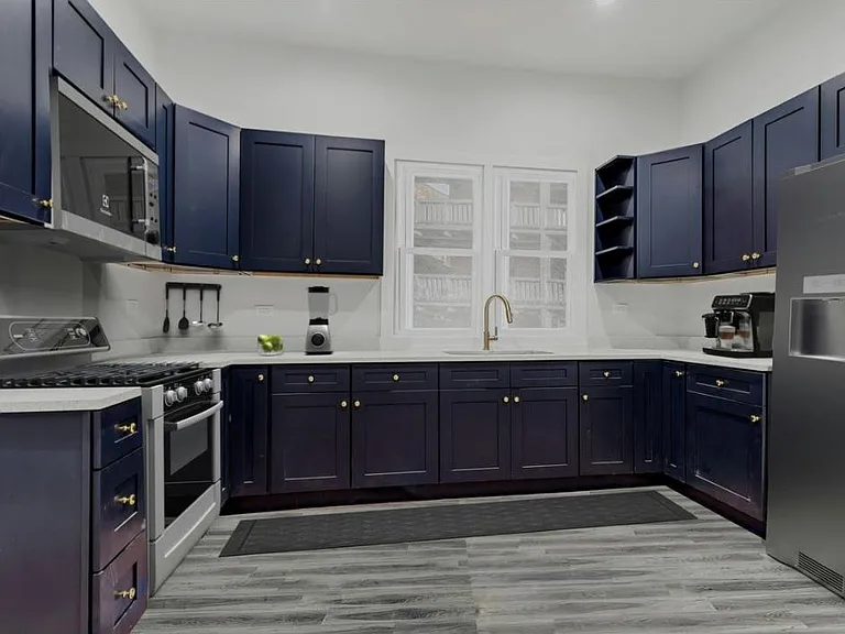 Beautiful modern cabinetry with all stainless steel appliances.