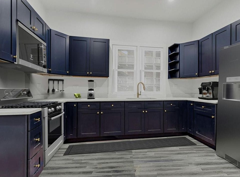 Beautiful modern cabinetry with all stainless steel appliances.