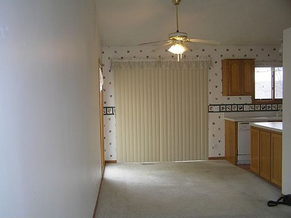 Dining Area that opens onto a deck to backyard