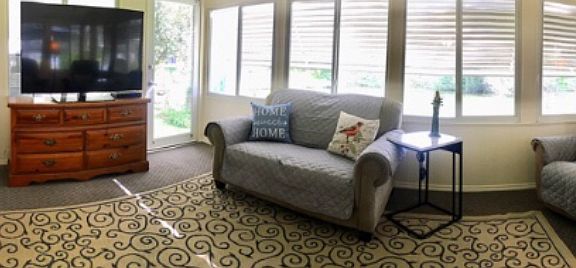  Sun room over looking lake.