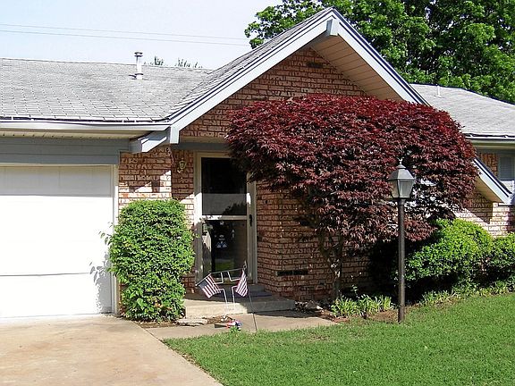 Front Door framed by Japanese Maple