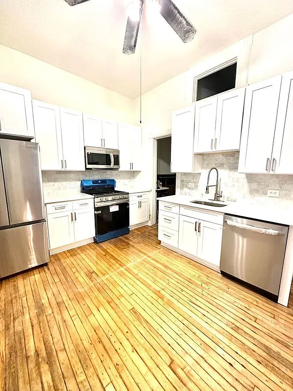 Building Photo - 1656 S Throop St #1R