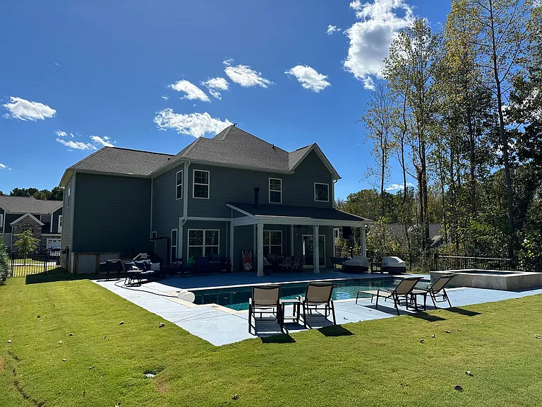 Private wooded fully fenced corner lot with salt water pool and tub, just perfect for elegant fun entertainment. All furniture available for rental as well