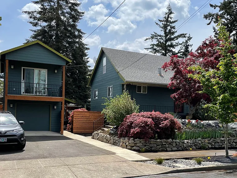 Front yard, we live in the skinny house.
