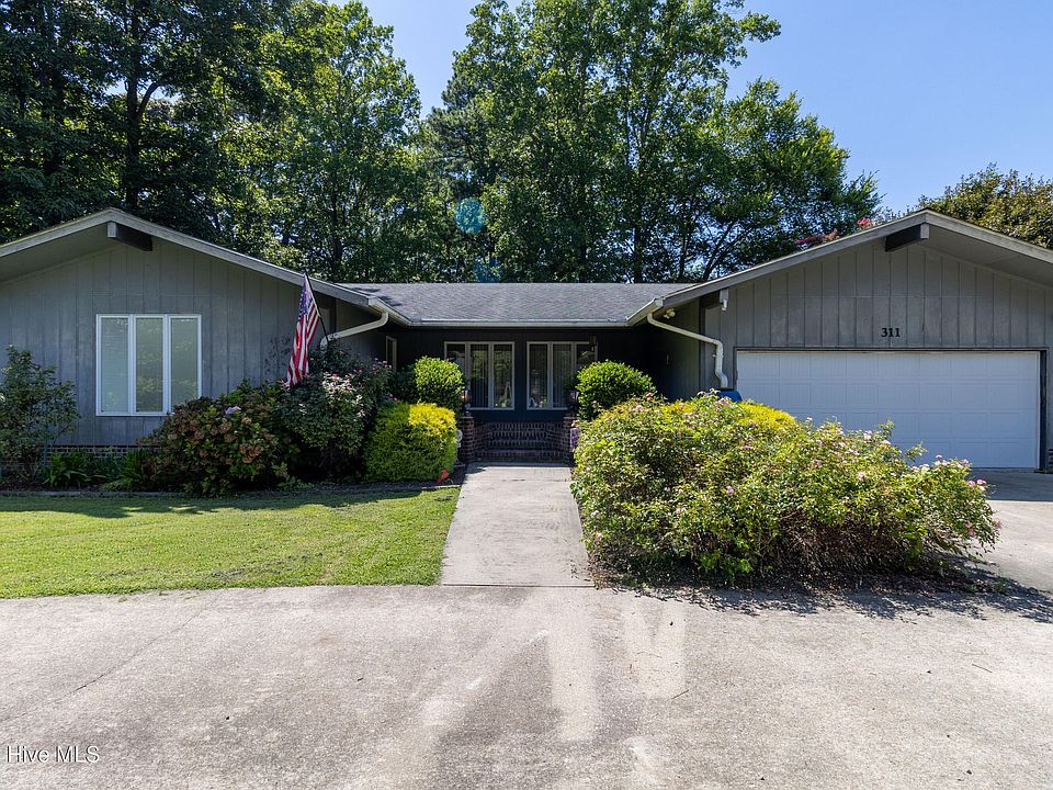 1st image of 311 Country Club Drive