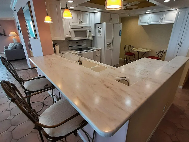 Granite Kitchen Counter with Chairs