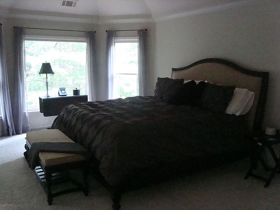 master bedroom has extra sitting area