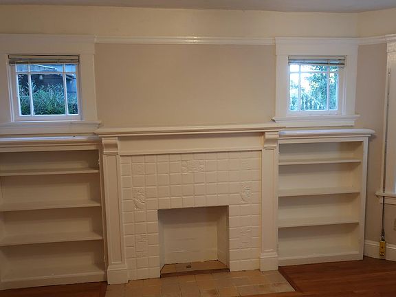 Bdrm #1 : built-ins : fireplace is ornamental