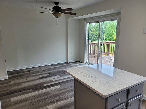Eat-in-Kitchen with sliding glass door to a relaxing and spacious deck.