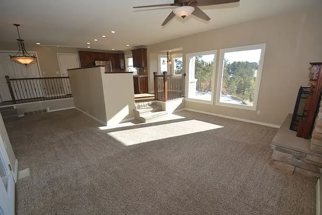 fireplace room looking at kitchen