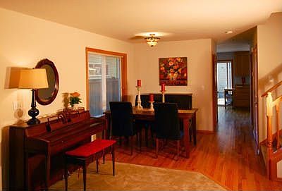 Open floor plan with large dining room and hardwoods...