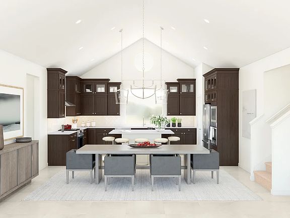 Dining area with vaulted ceiling