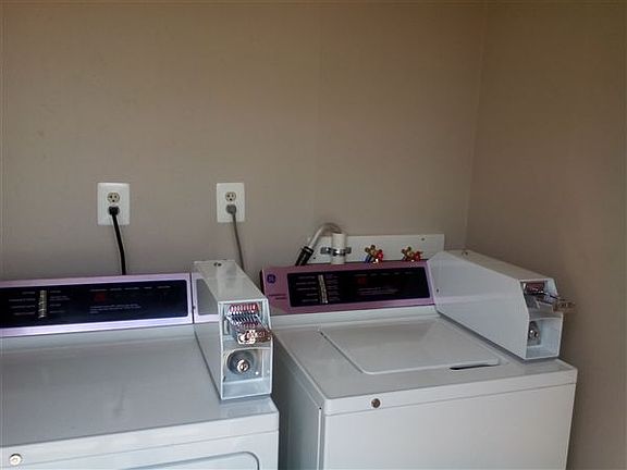 brand new coin laundry room
