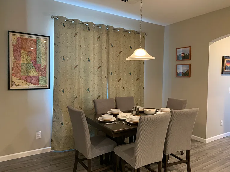 Cozy dining area with a table and six chairs