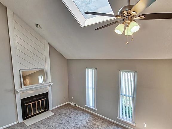 Skylight with Sun Shades, Vaulted ceilings, New Ceiling fan, New Carpet throughout