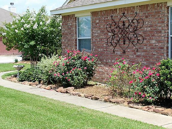Beautifully landscaped front walk way