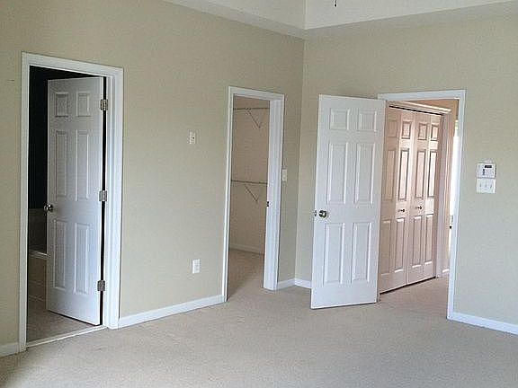 Master Bedroom with Ceiling Fan and huge walk in closet