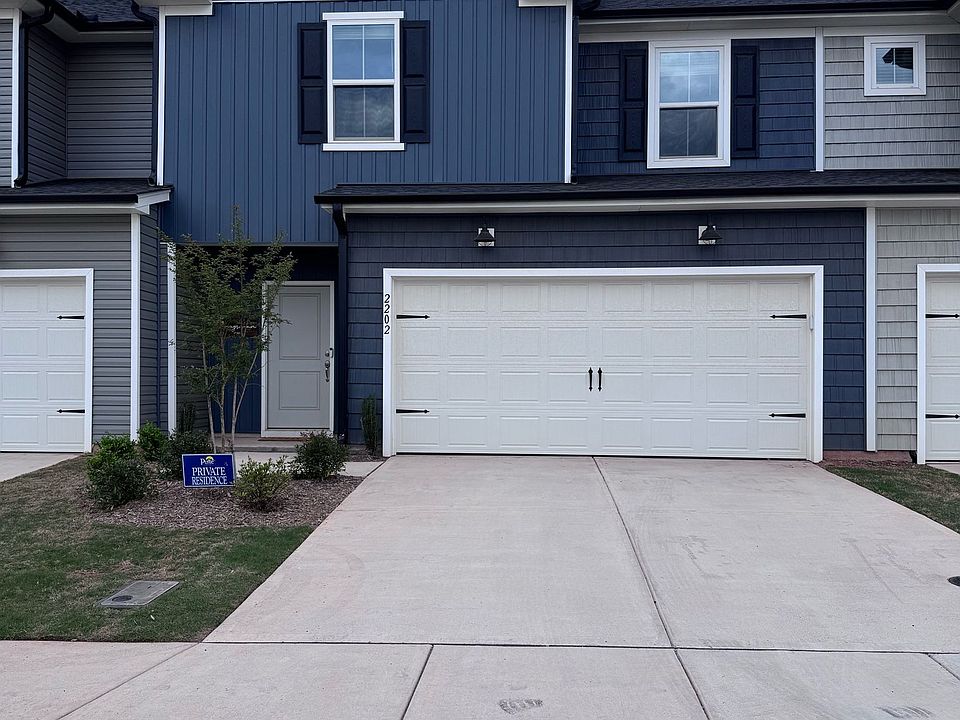 Charming Front Porch _ Ideal for your morning coffee.
Spacious 2 Car garage.