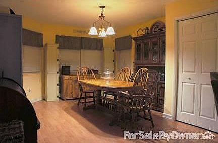 LARGE updated EIK has cabinets galore!
						:
						Friends/family will gather in your EIK. Newer appliances, Corian counters. Nice!