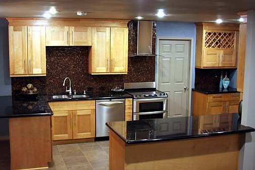 All New Contemporary Kitchen highlighted w/ beautiful Mosaic glass backsplaash