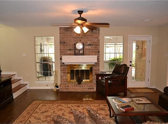 Den with Wood Laminate Floors.