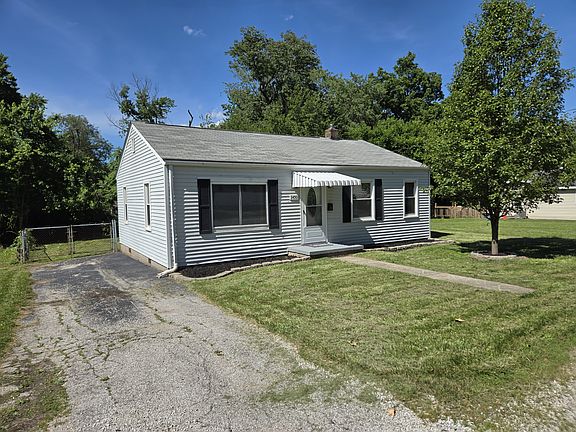 driveway and fenced back yard