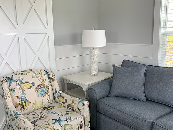 The couch pulls out to a queen-size bed for occasional guests.