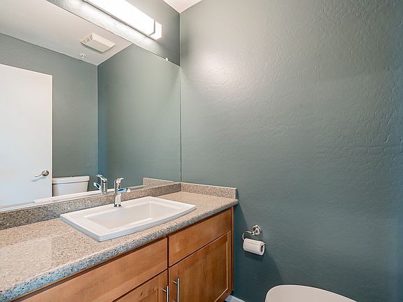 Half bath off kitchen/common area