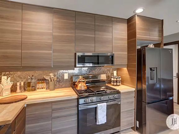 Luxurious kitchen fully equipped with everything you need to cook, dine, and entertain comfortably.