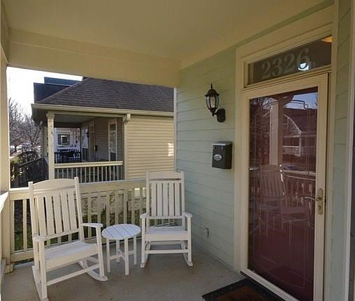 Covered porch area is large enough for sitting and relaxing!