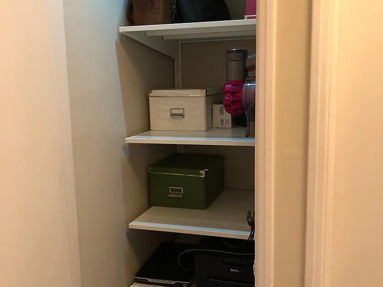 Hall closet with additional storage