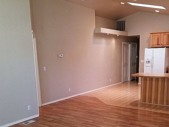 Family looking toward kitche