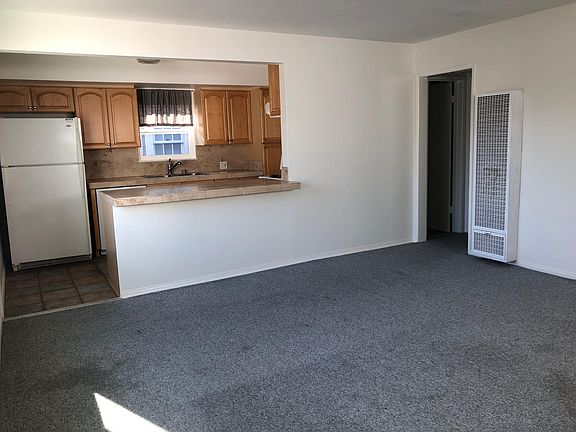 Spacious living room and kitchen.