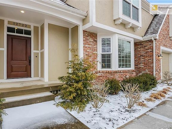Front Entry with mature landscaping front and back.