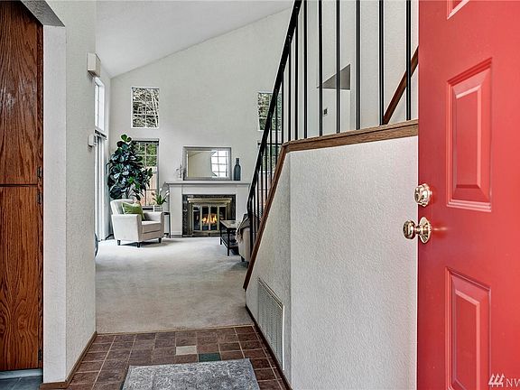 Vaulted ceilings and multi-level windows provide wonderful natural light and openness.