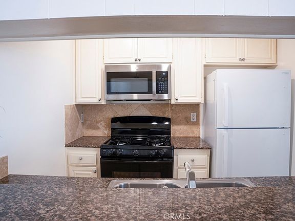 5th image of 7035 Woodley Ave Unit 115