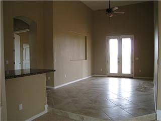 Wetbar on right w/refridgerator and large dining area