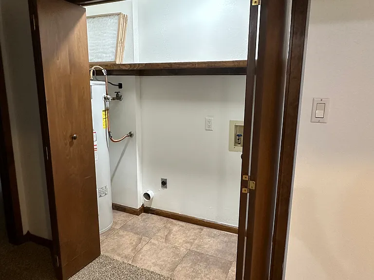 Laundry closet off of hallway