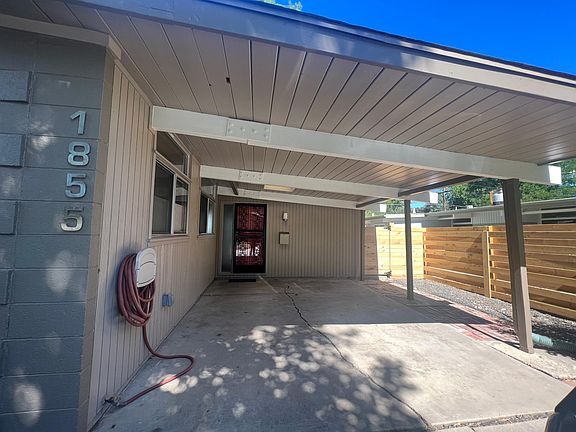 Car port with Iron storm door