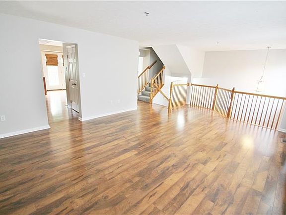 There's a great flow here with access to the kitchen and dining area.