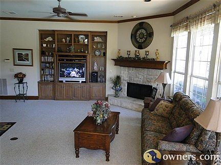 Main level family room, built-in entertainment center, gas fp