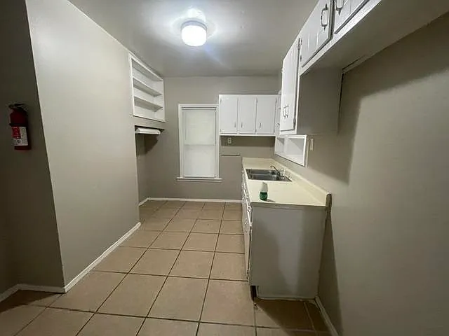 3652 Faxon Ave — Photo 9