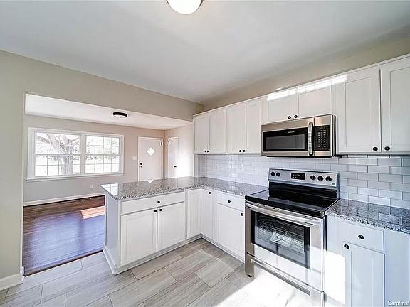 Kitchen space, looking out to main living area